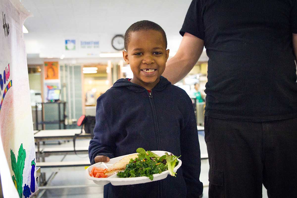 Boy with plate of food